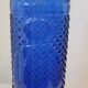 Vintage decanter bottle made of blue molded pressed glass