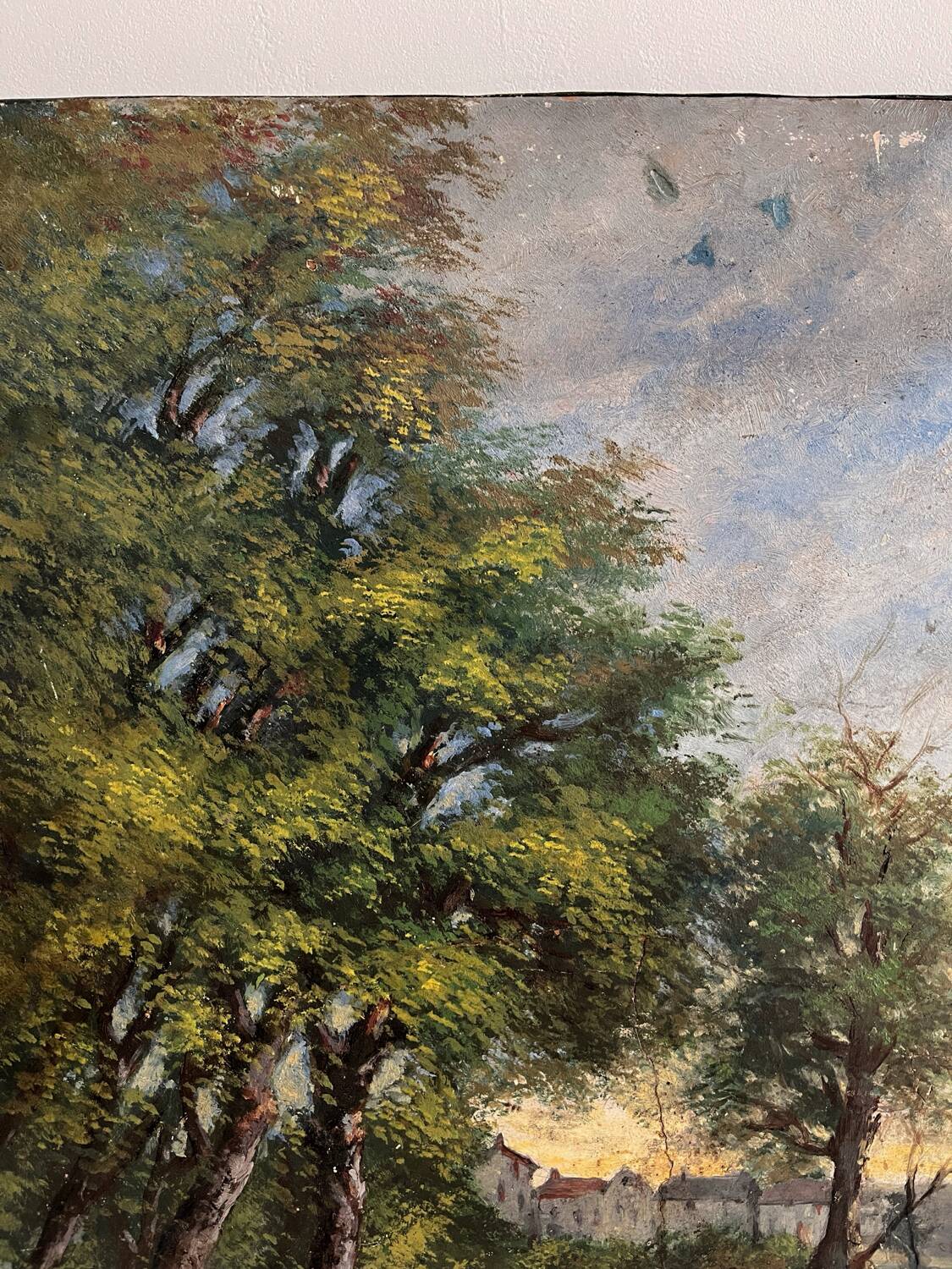 Old oil painting on canvas of a landscape by the pond.