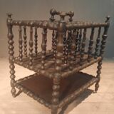 Rosewood magazine rack on casters