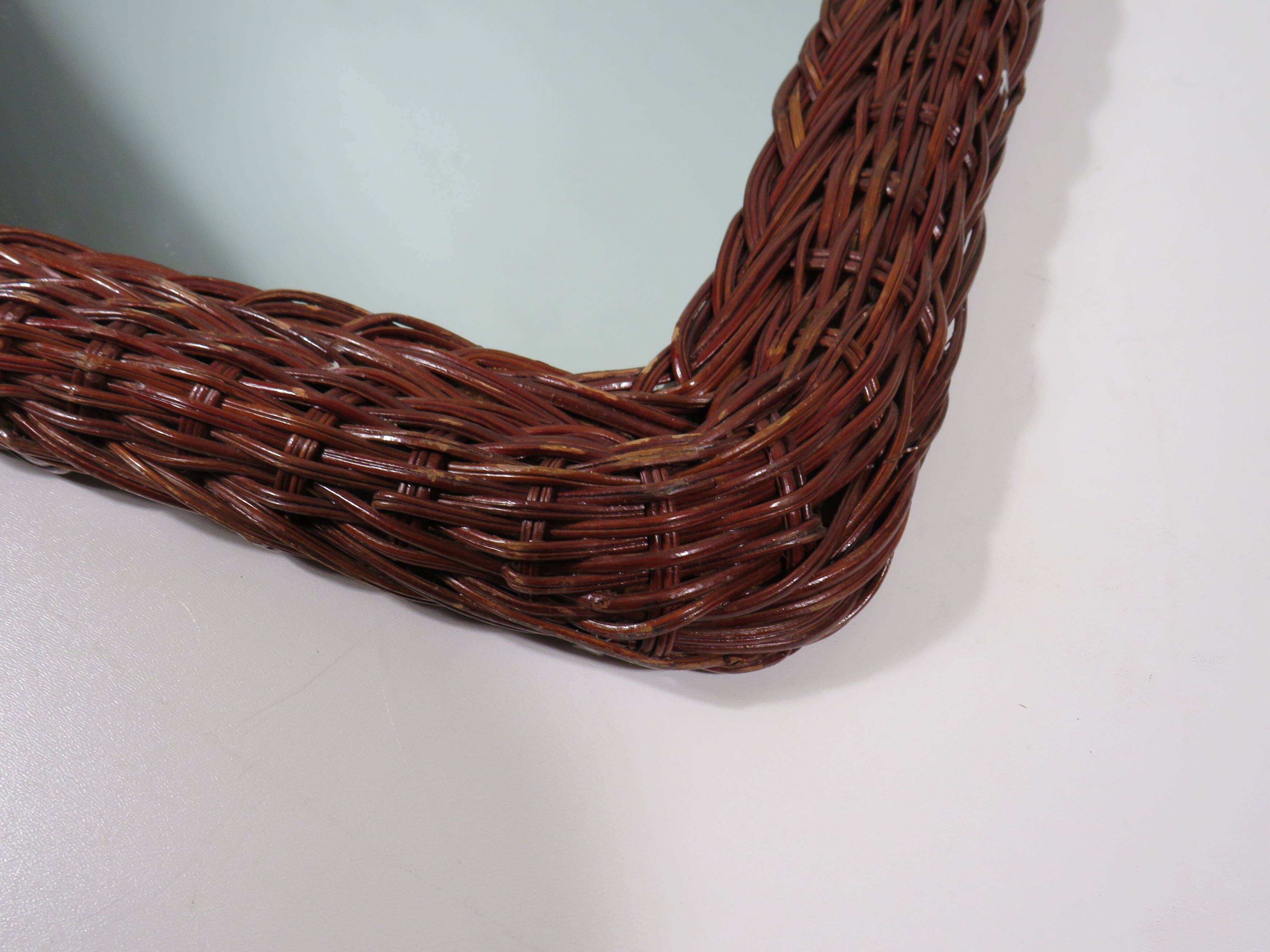 Vintage mirror with wicker border