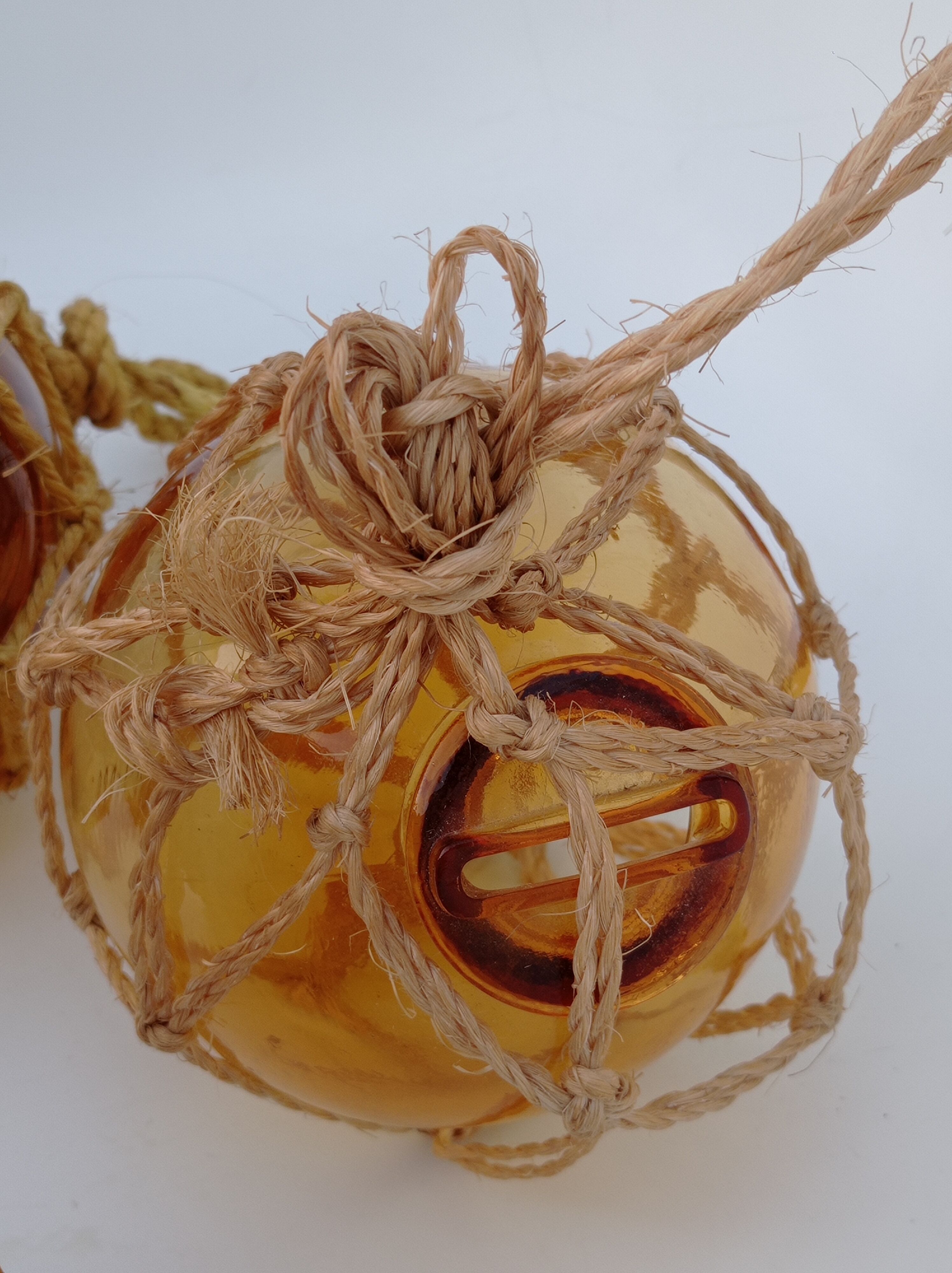 3 amber glass trawl balls