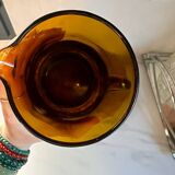 Vintage orange and wicker carafe