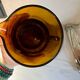 Vintage orange and wicker carafe
