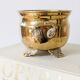 Cache-pot vintage en laiton sur pieds avec anses