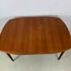 Extendable table by Gustav Bahus with 4 chairs by Peter Hvidt