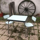 Table and chairs in water green formica