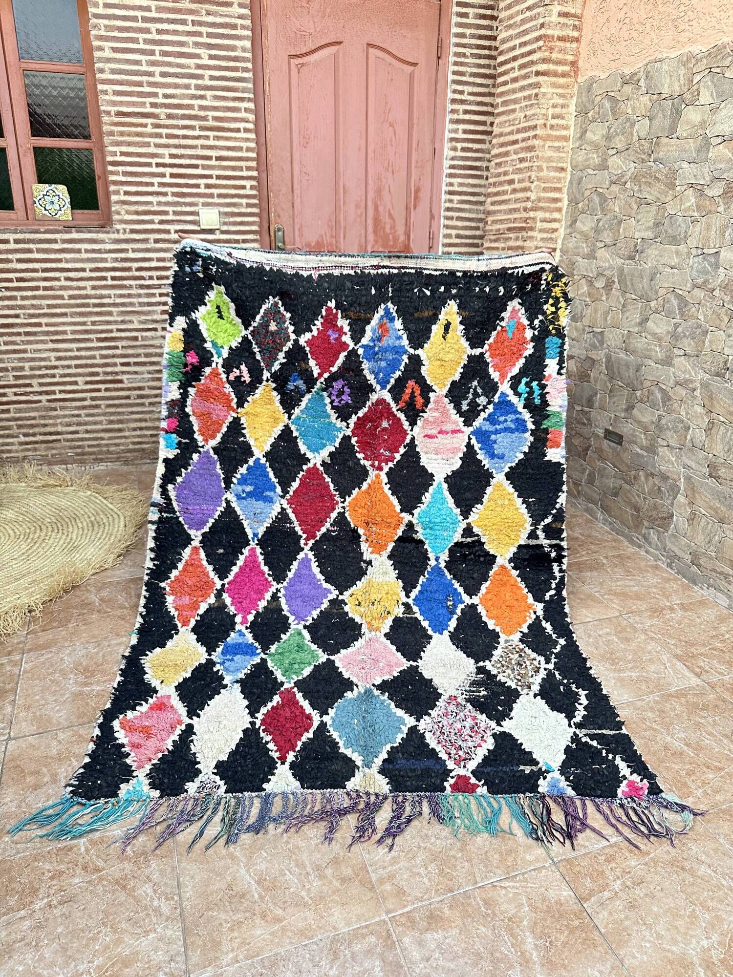 Vintage Boucherouite Berber rug: Hand-knotted Moroccan rug.