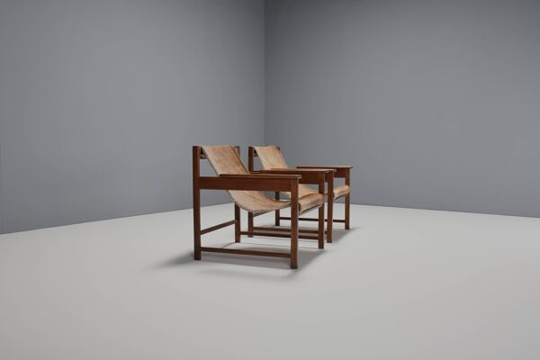 Paire de fauteuils 'Lia' de Sérgio Rodrigues, Brésil, 1962, Jacaranda et peau de vache
