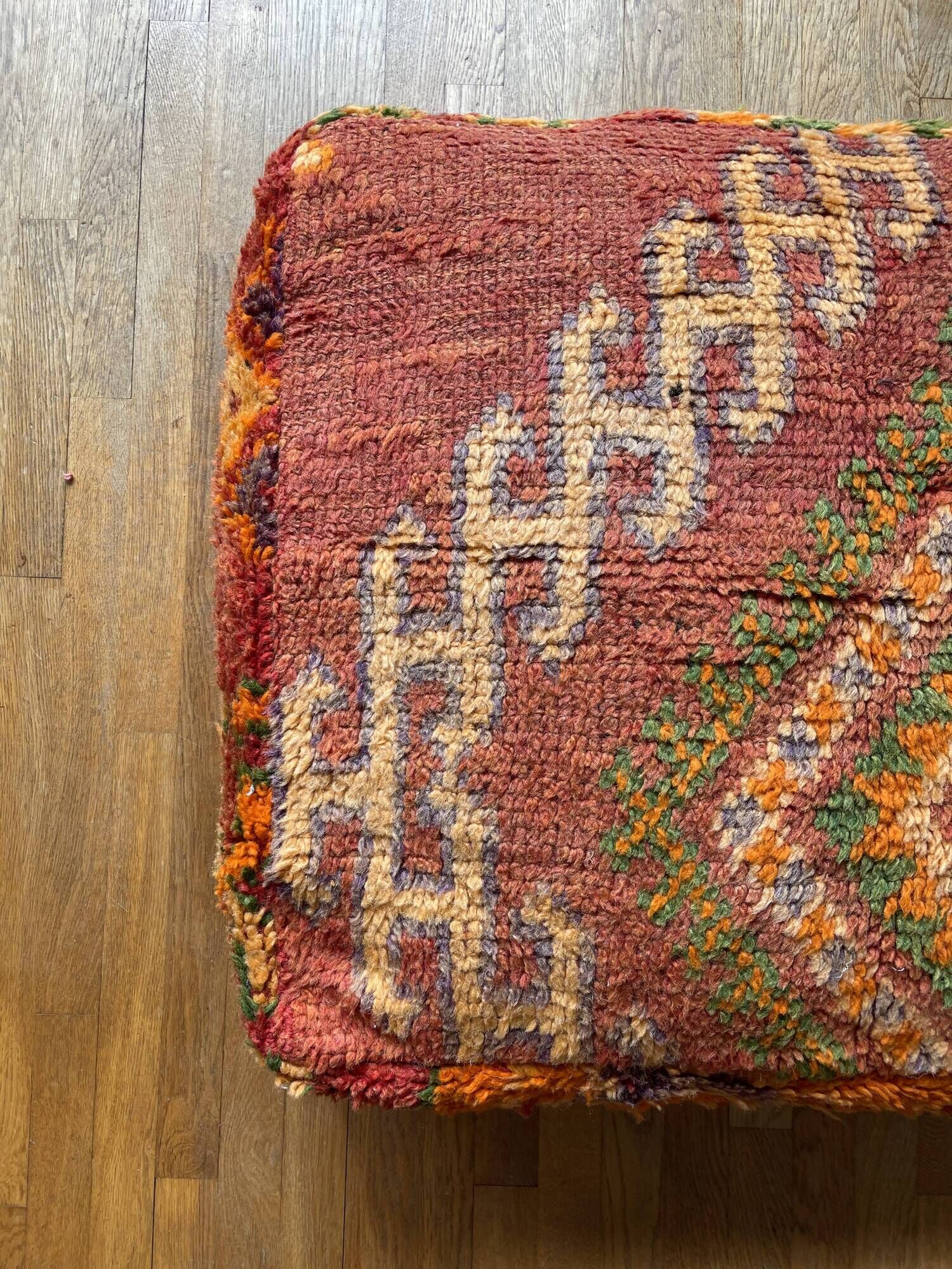 Moroccan Berber pouf colorful terracotta orange and bohemian green
