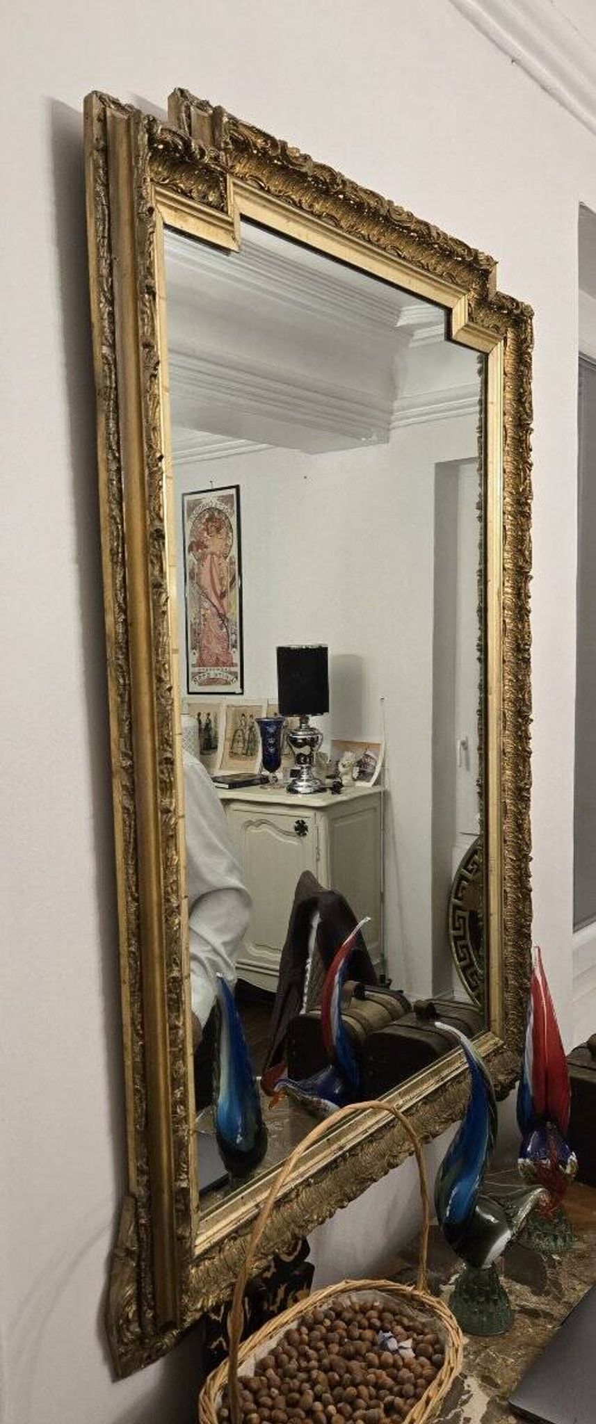 Large antique mirror from the Napoléon III era, finely carved and gilded with gold leaf.