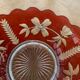 Red and transparent glass bowl with floral motifs and vintage wheat cobs