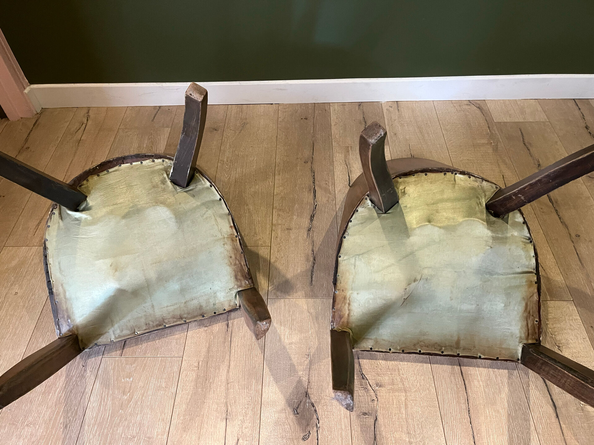 Pair of green leather gondola chairs Art Deco by De Coen