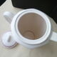 Old coffee maker, pourer in half porcelain of Badonviller