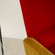 Red and mustard yellow fabric armchair in 1970s style