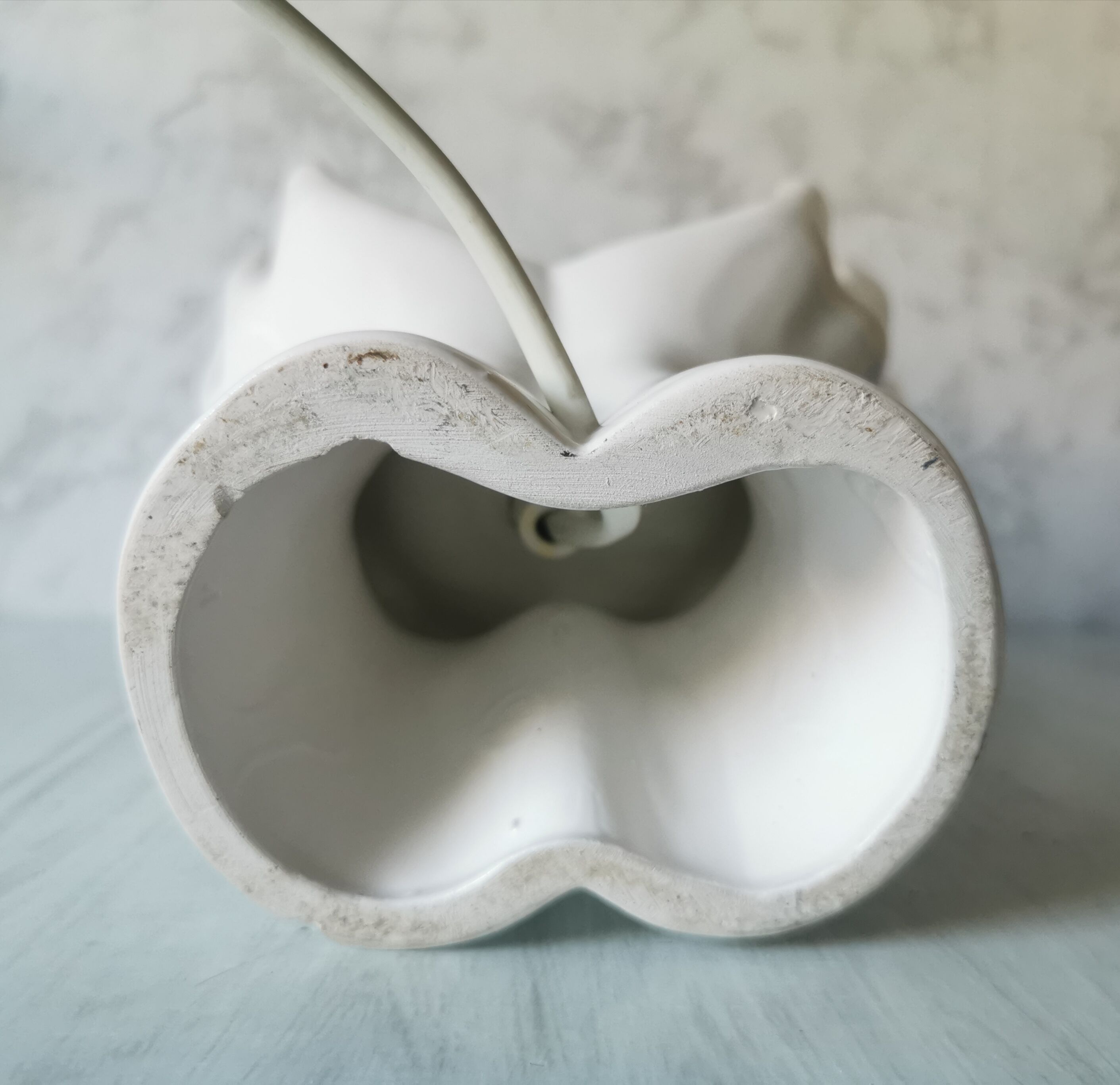 White ceramic hand lamp