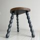 Antique wooden tripod stool with turned legs