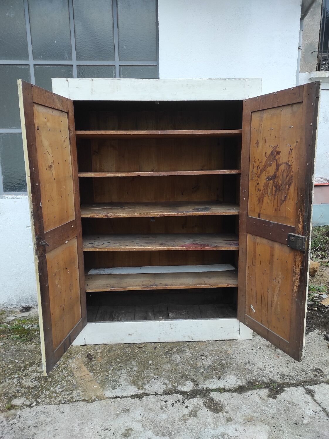 Old rustic Parisian wardrobe patinated white in oak and fir