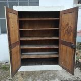 Old rustic Parisian wardrobe patinated white in oak and fir