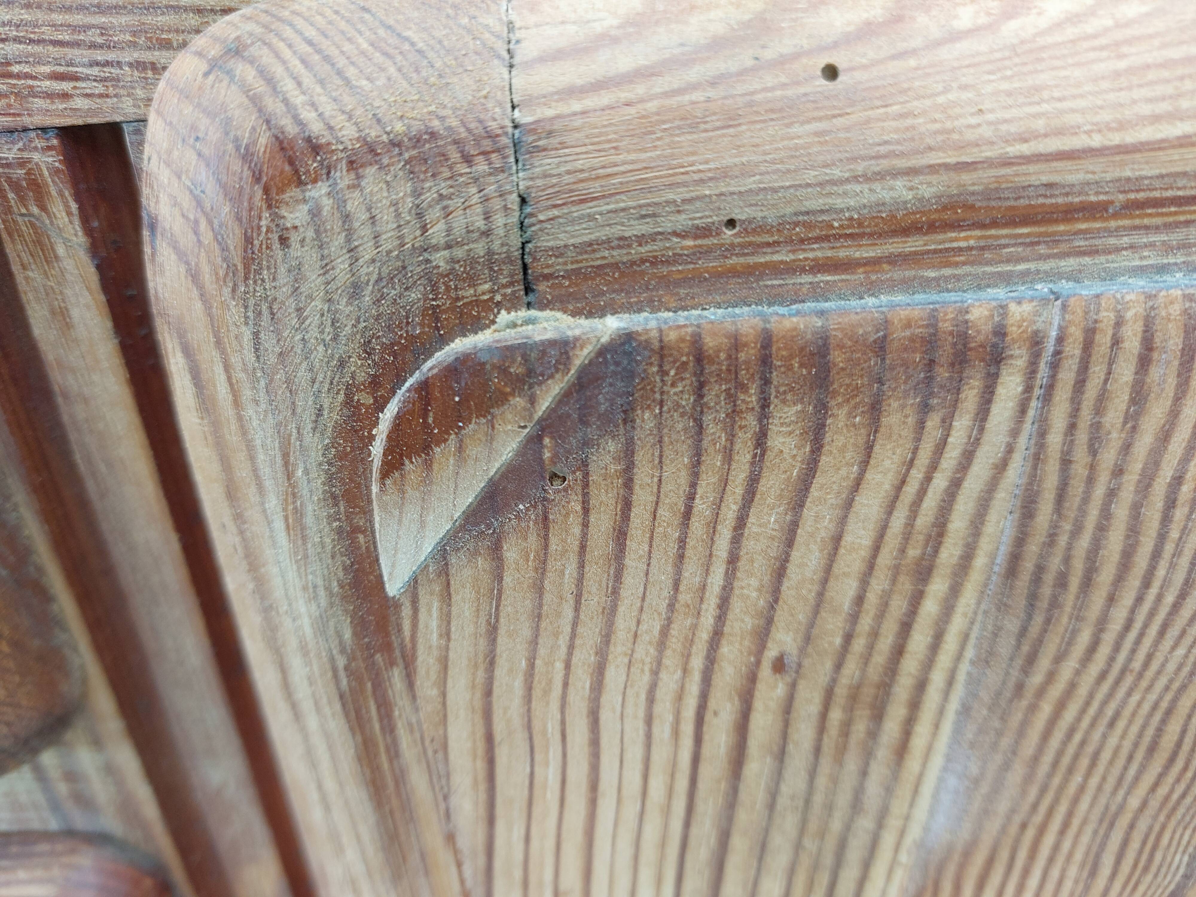 Vintage wooden buffet with a marble top.