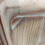 Vintage wooden buffet with a marble top.