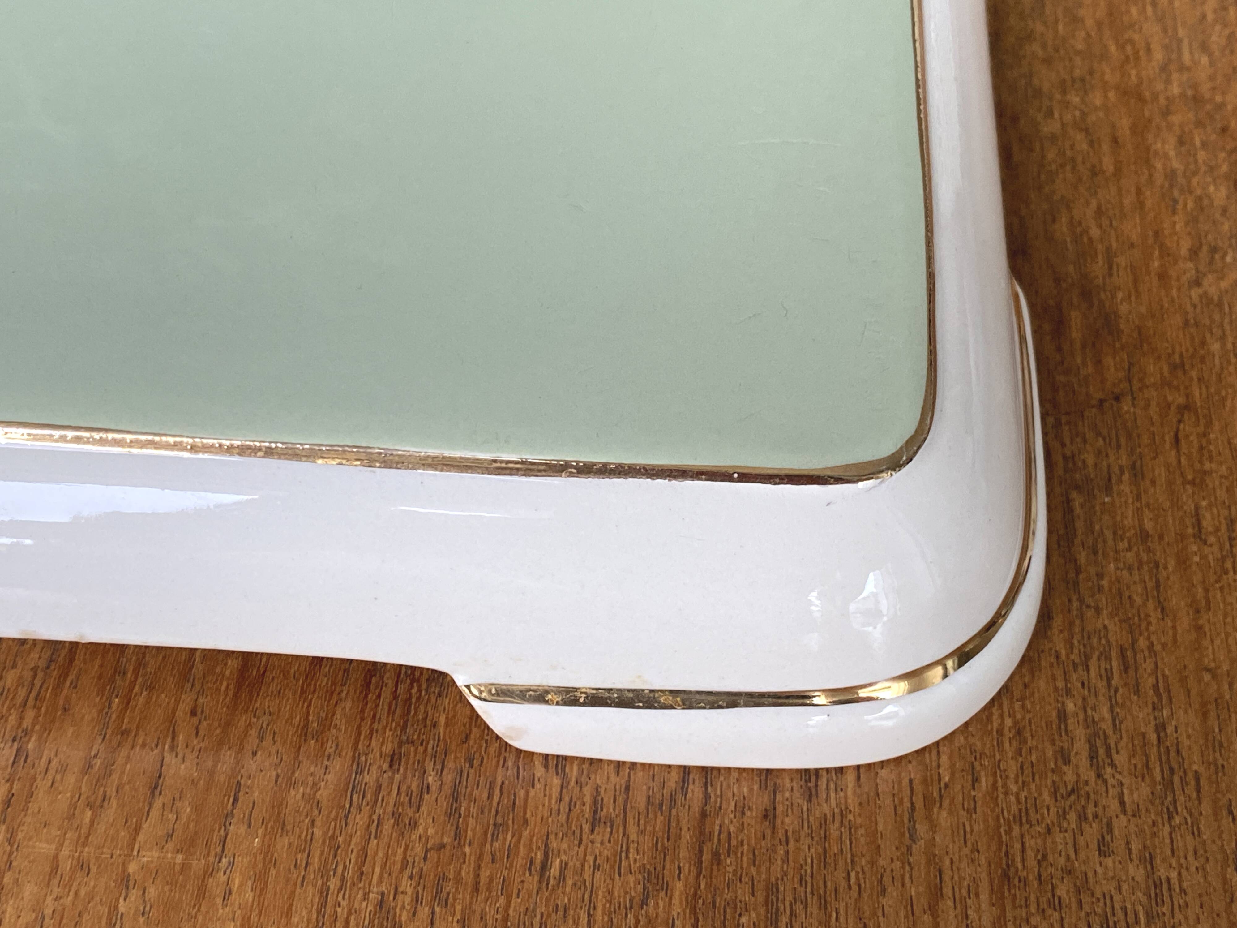 Important vintage trivet in celadon green faience by Villeroy & Boch.