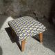 Armchair and its footrest 60s