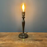 Black table lamp with paint splatters from the 1920s