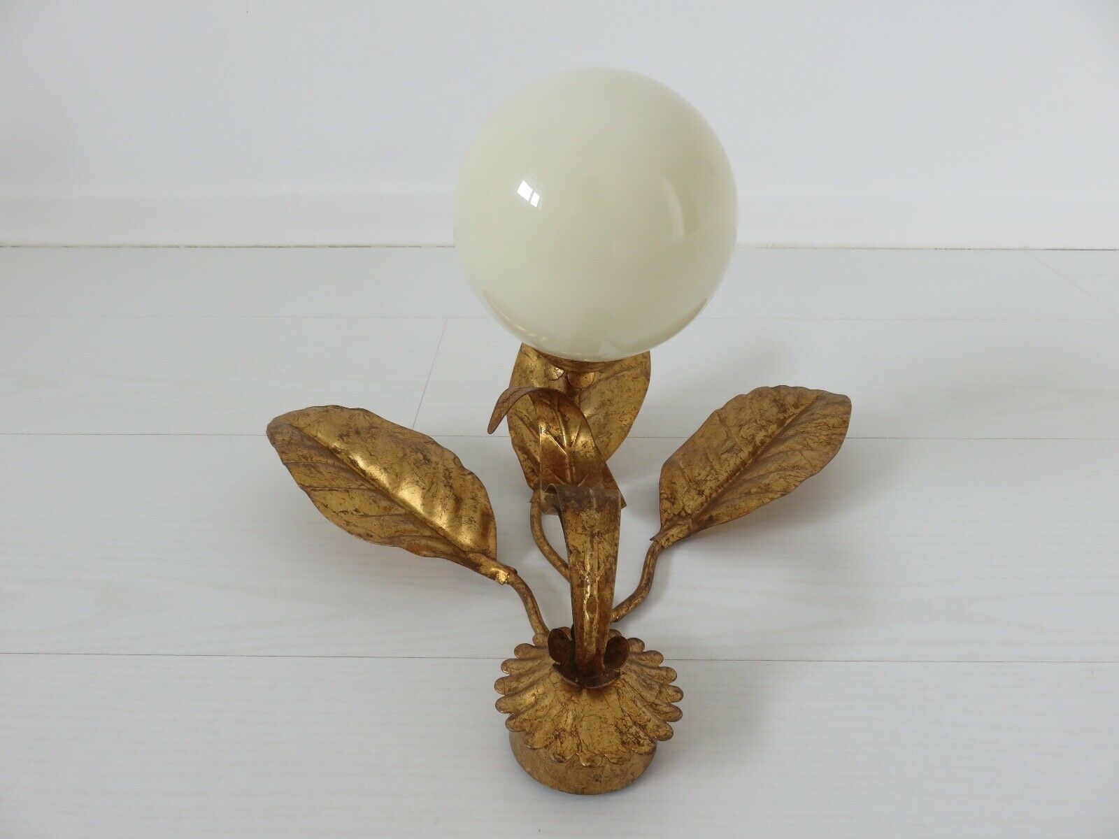 Wall lamp " flower " in golden metal and opaline ball 70s