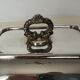 Dish in silver metal