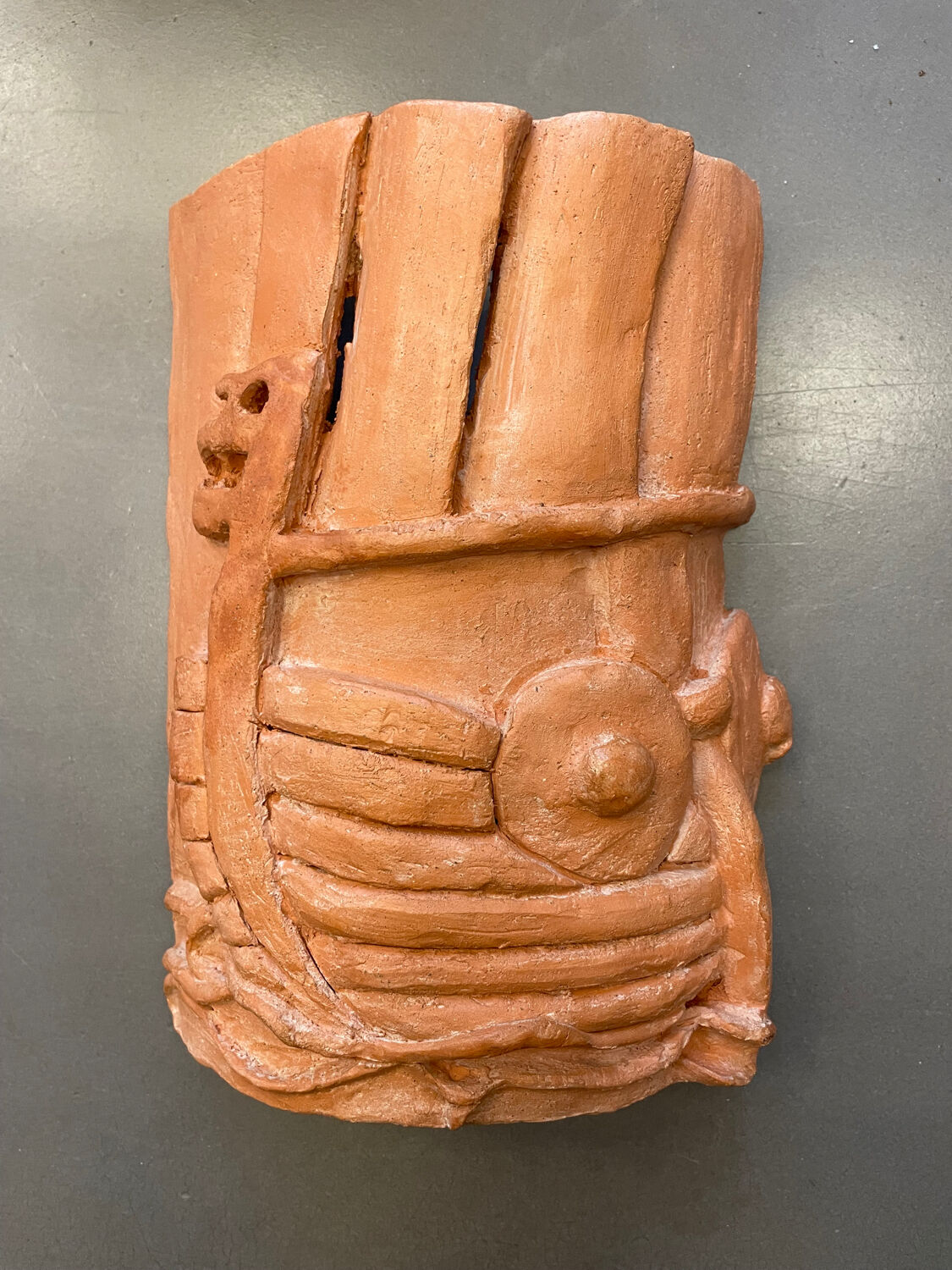 Terracotta sculpture wall light