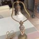 Antique lamp in enamelled porcelain and bronze