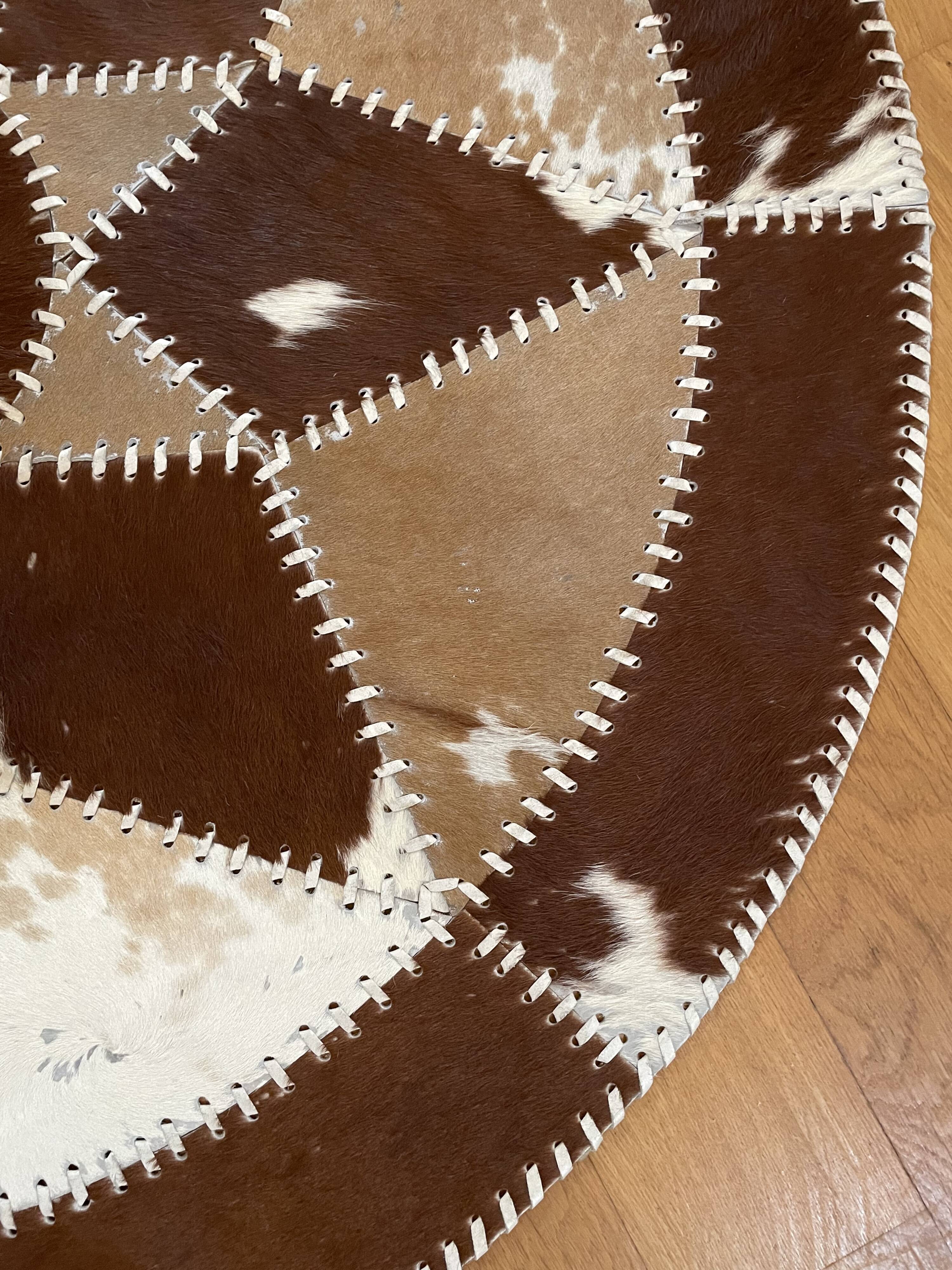 Vintage round cowhide rug 70