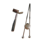 Pince et marteau à glace par Jacques Adnet
