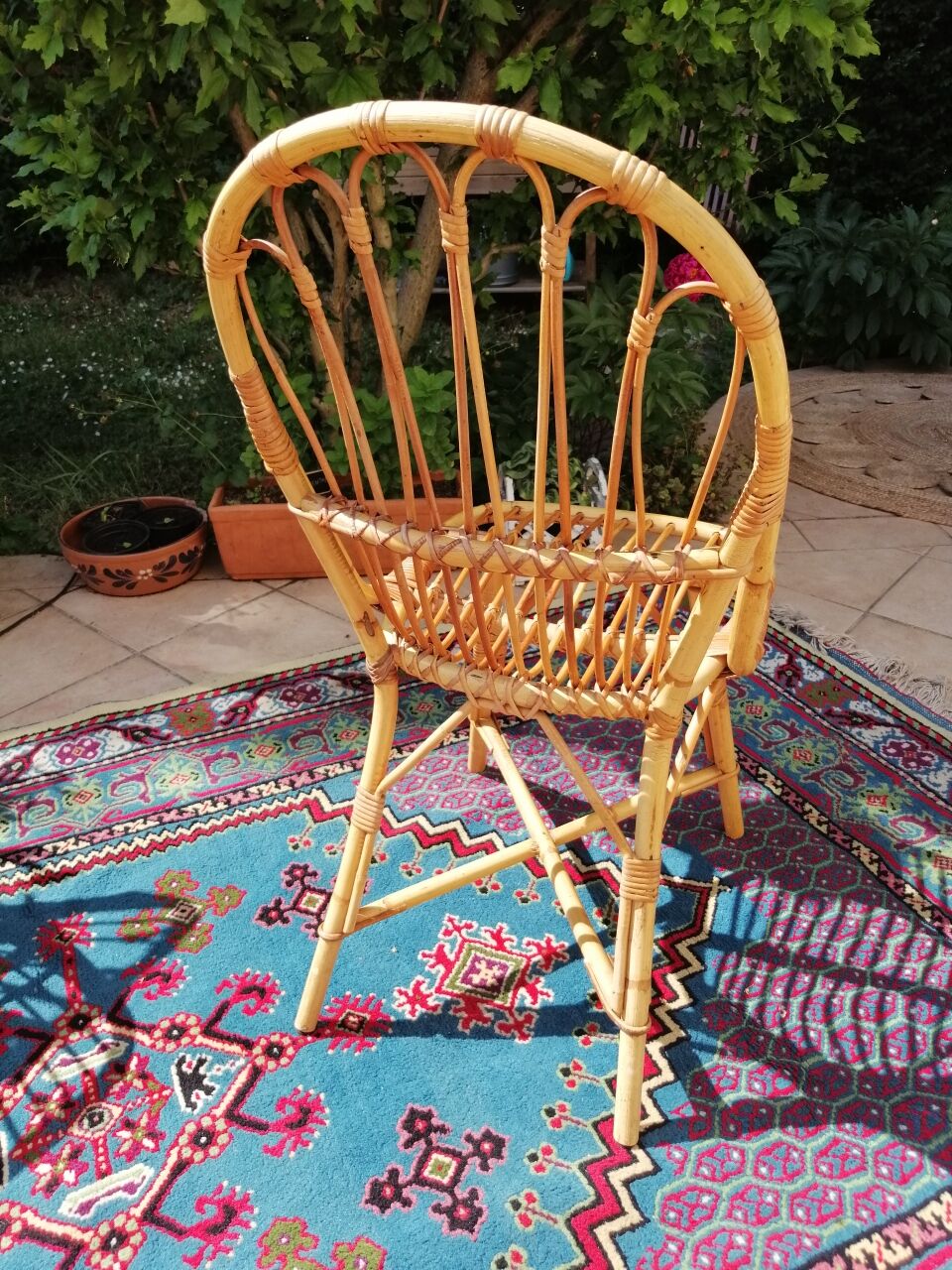 Series of 4 vintage rattan chairs.