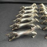 12 porte-couteaux en métal argenté zoomorphe