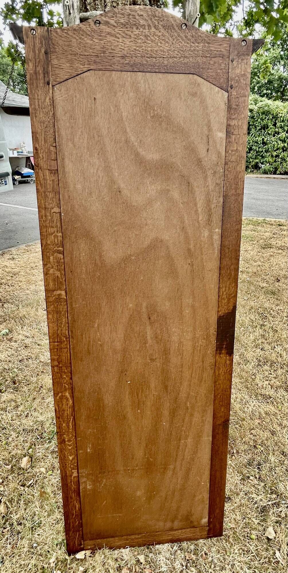 Large and old bevelled framed floor mirror.