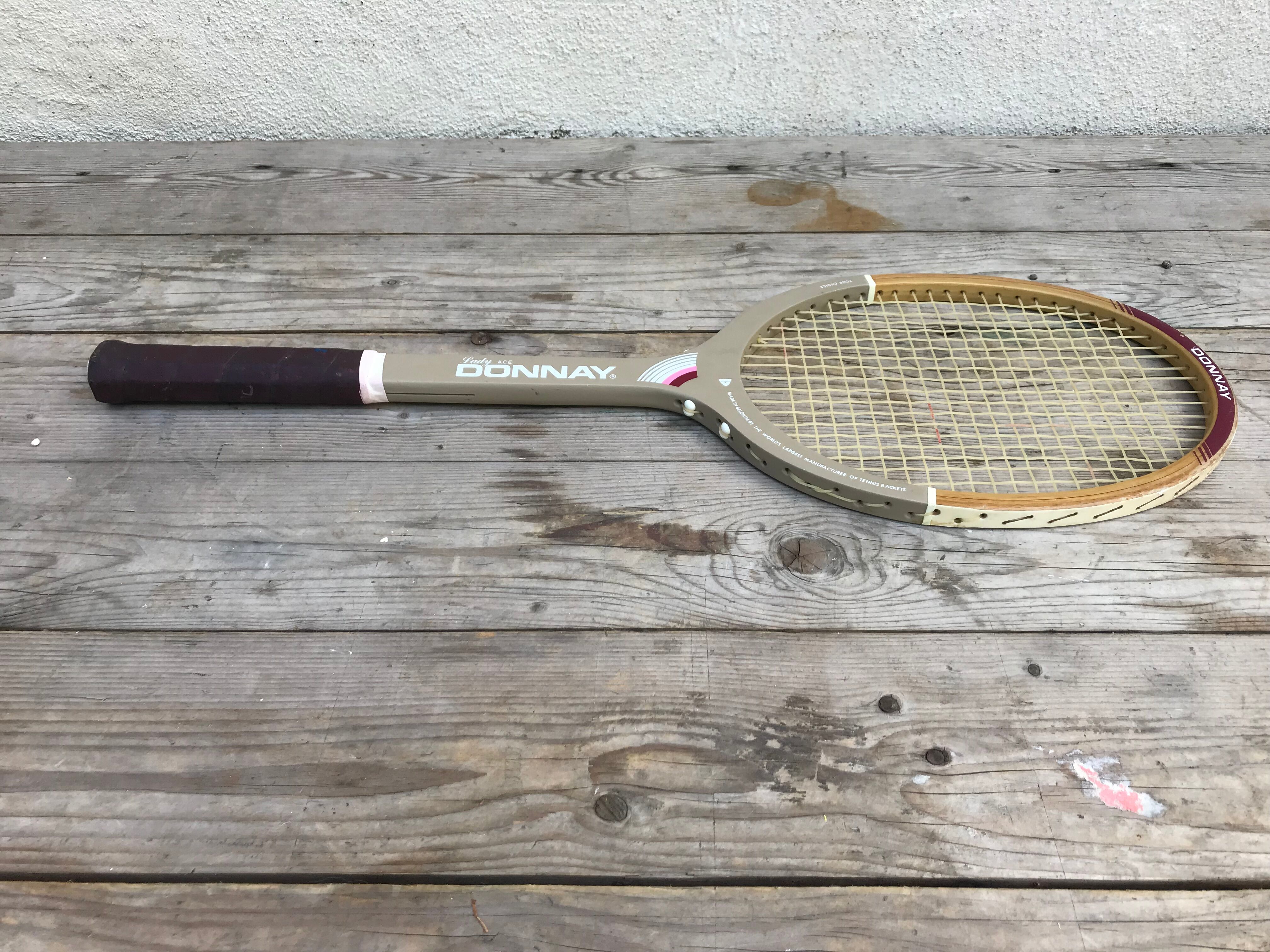 Old lady ace wood and leather vintage tennis racquet