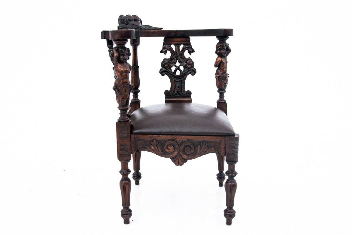Antique corner armchair, Western Europe, circa 1900.