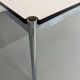 Large table design USM Haller with a white top and chrome structure.