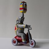 Vintage mechanical toys 'JW /Germany Western' 'Elephant on scooter'