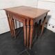 Nest of tables in solid cherry wood from the mid-20th century.