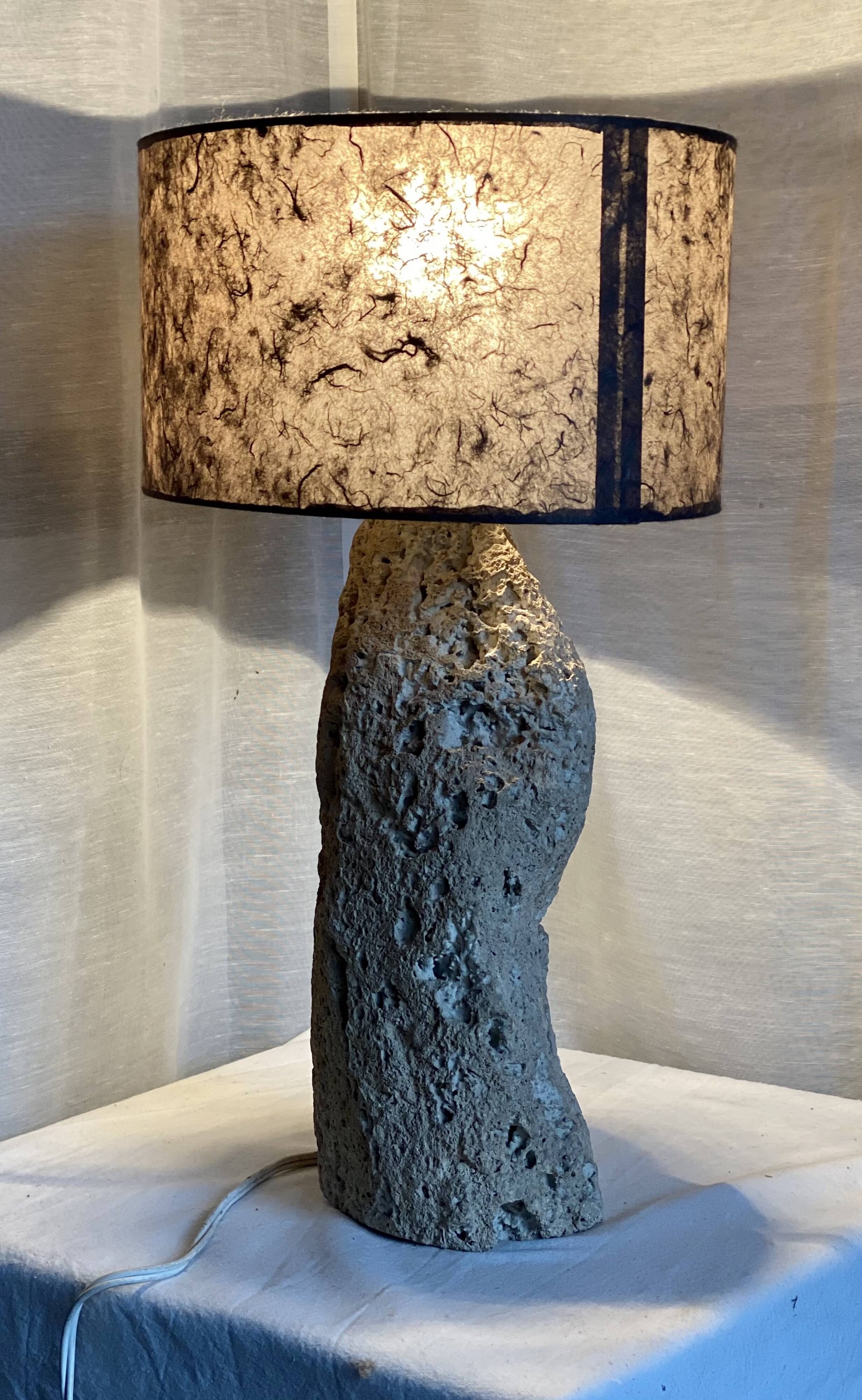 Brutalist vintage stone lamp from the 1970s, raw art.