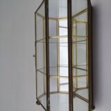 Vintage showcase in brass, glass and mirrors
