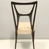 Ensemble de six chaises de salle à manger en hêtre noirci avec revêtement en skaï ivoire, Italie