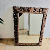 Carved wooden mirror
