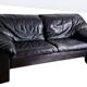 Cocooning black leather sofa