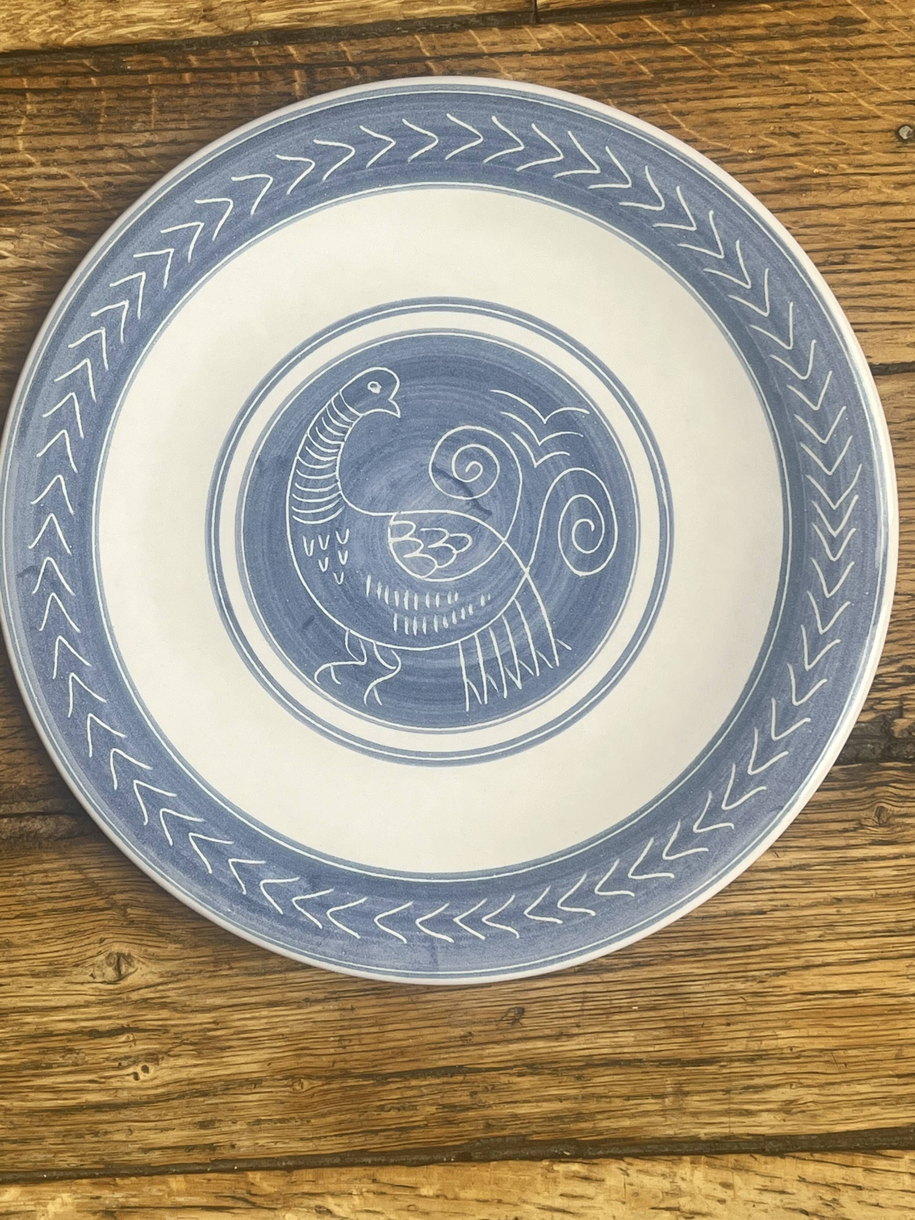 Large plate with the blue bird by Yvon Roy manufacture.