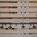 Coats in wrought iron door