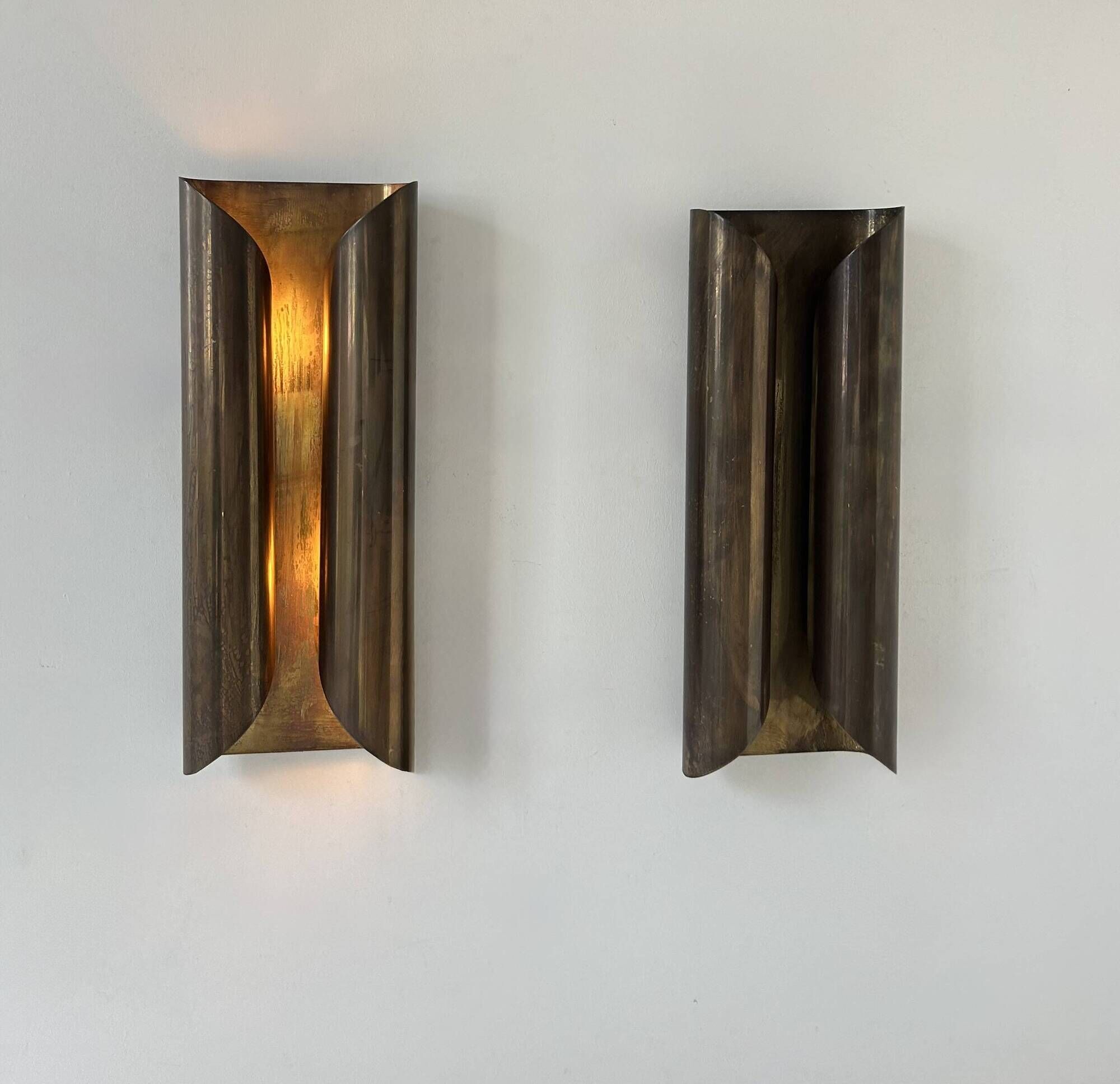 Pair of vintage wall lights in patinated brass, France 1970