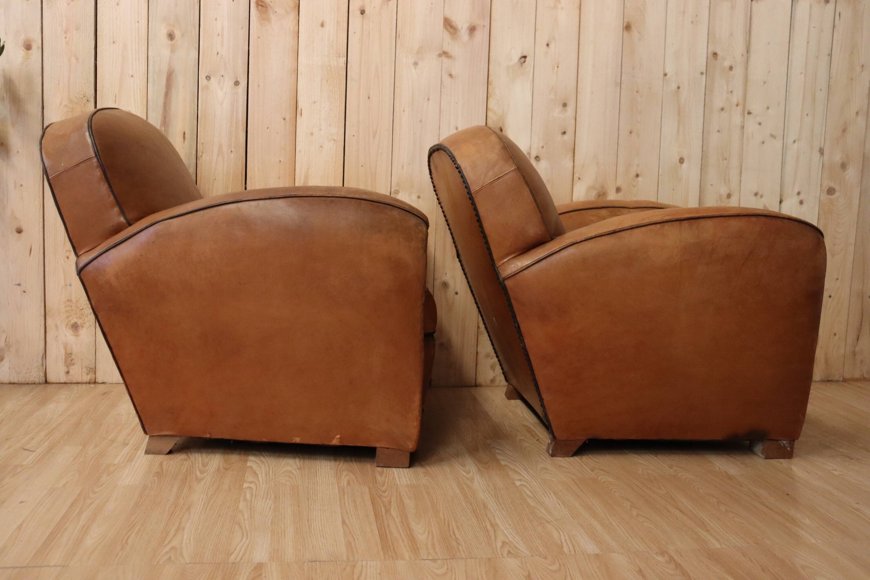 Pair of Art Deco leather club armchairs from the 1930s.